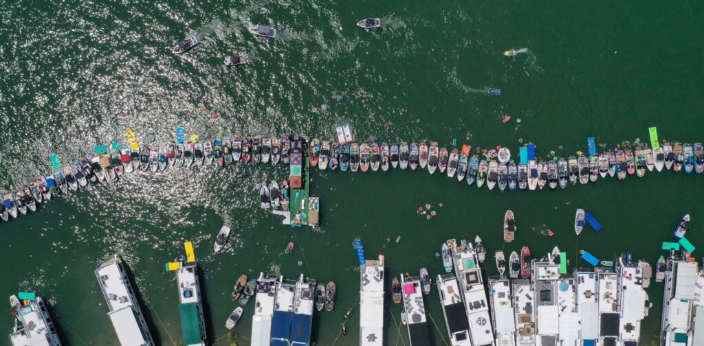 boats lined up at a marina at Center Hill Lake Wakefest competition